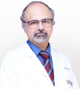 Dr. Manmohan M. Kamat