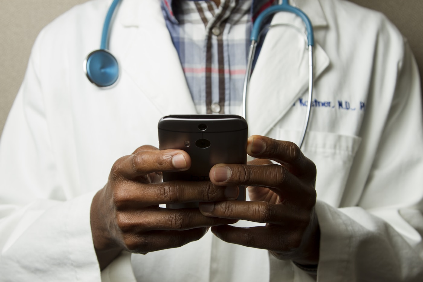 Doctor reviewing medical reports with a patient