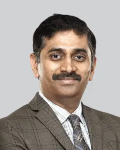 Dr. Anoop P